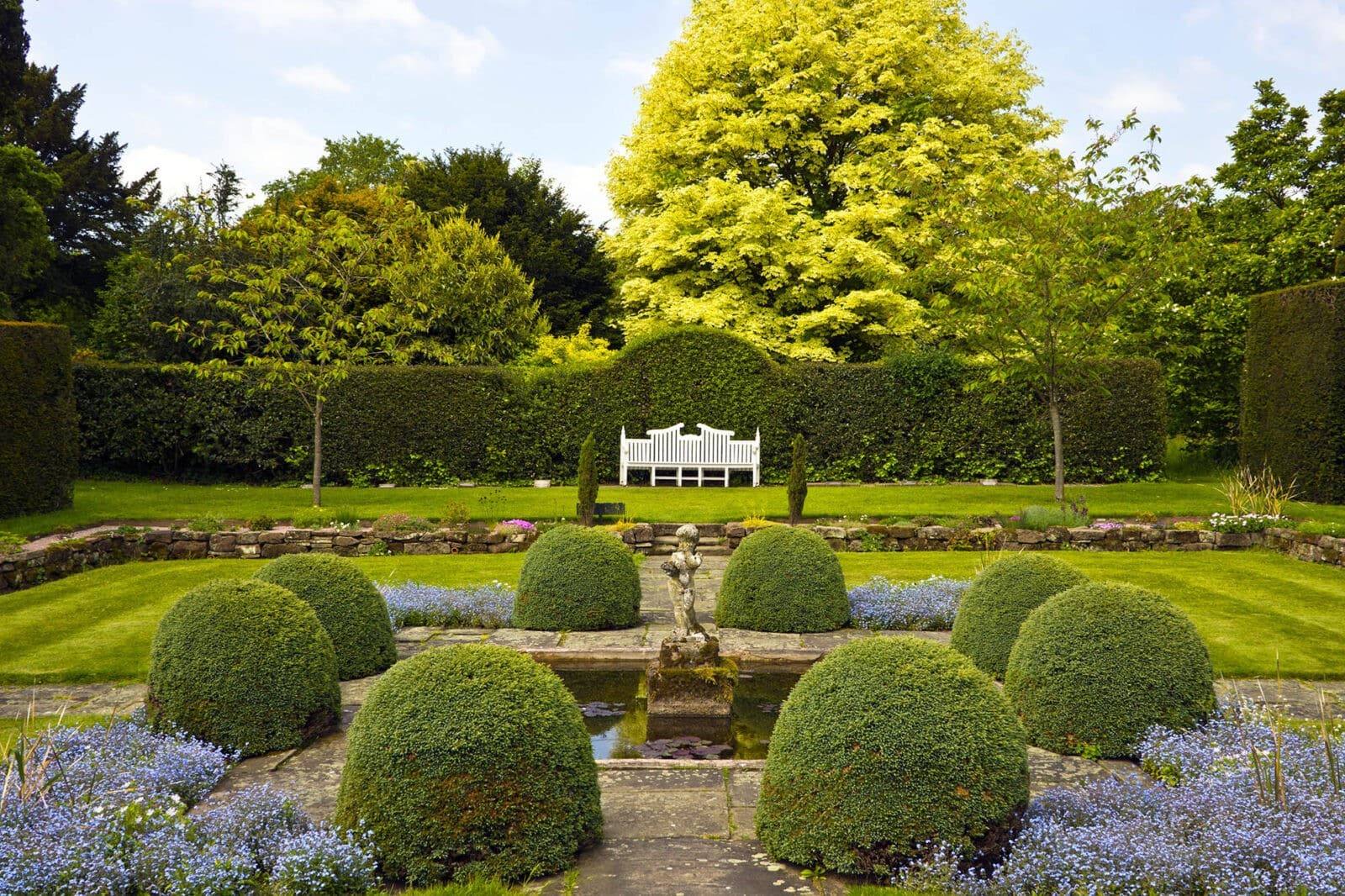 Large formal garden with lots of box spheres