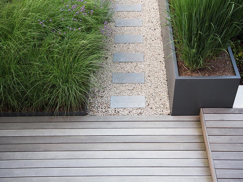 decking, gravel and planters in a contemporary garden