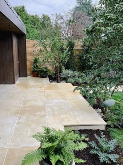 natural sawn sandstone paving in a contemporary garden