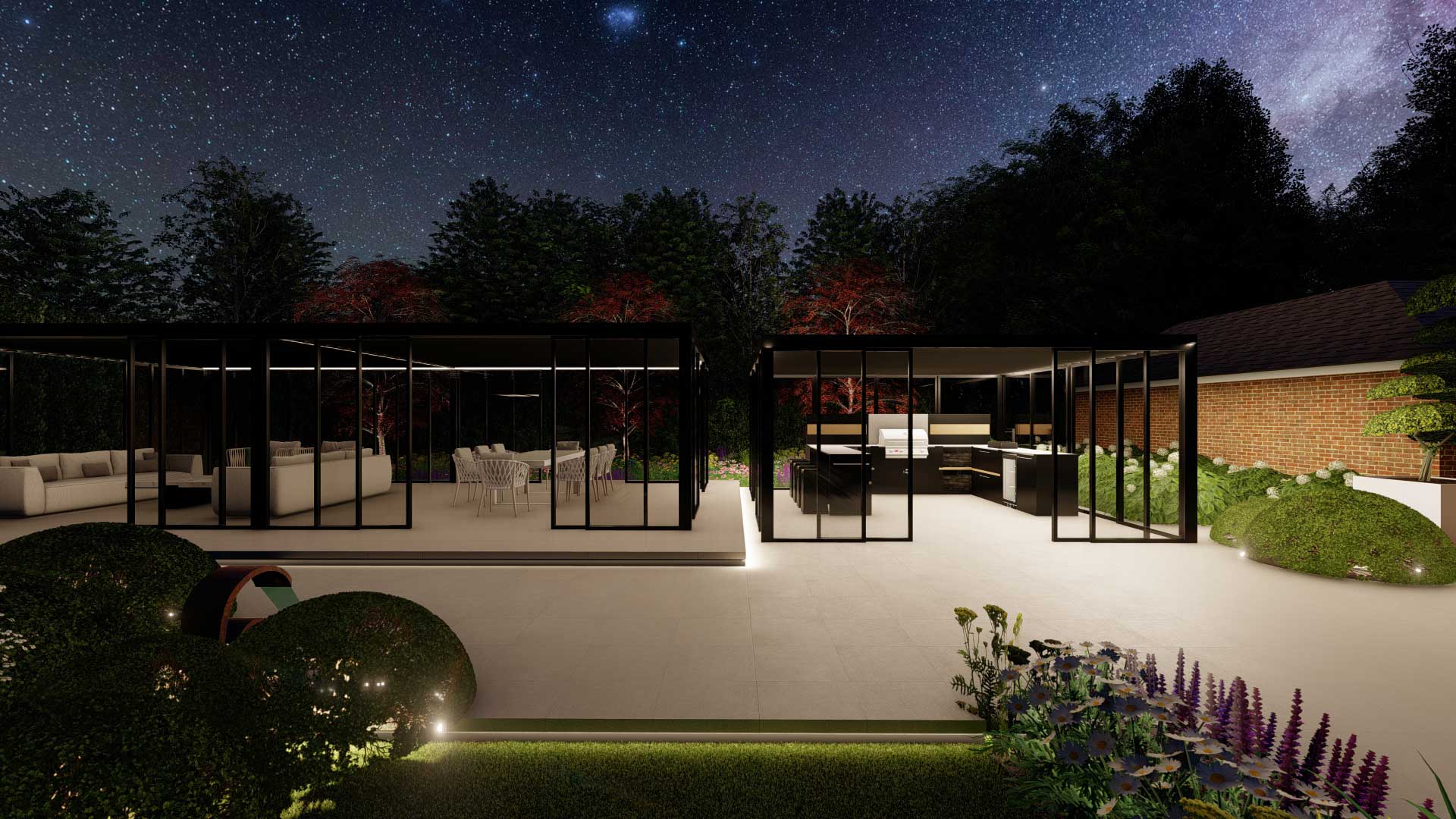 Night view of a garden with lots of lights, showing an aluminium garden pergola in black with some lovely planting in borders