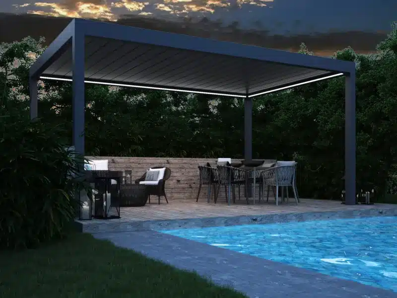 stunning aluminium garden pergola with ambient light around the inside edge. There is an outside kitchen, and a stunning small swimming pool.